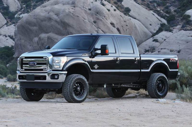 Load image into Gallery viewer, Fabtech 08-16 Ford F250/F350 4WD 4in Rad Arm Sys w/Coils & Stealth