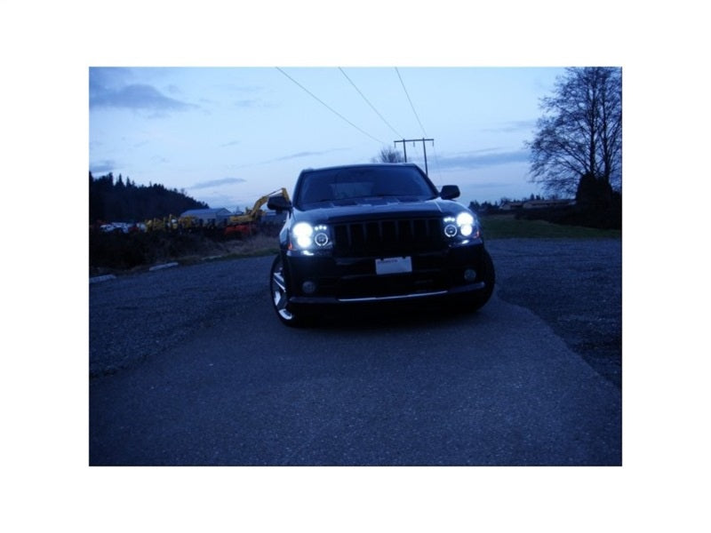 Load image into Gallery viewer, Spyder Jeep Grand Cherokee 05-07 Projector Headlights LED Halo LED Blk Low 9006 PRO-YD-JGC05-HL-BK