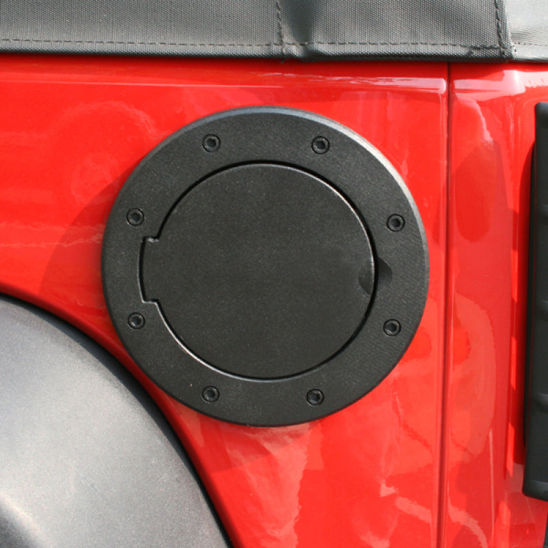 Load image into Gallery viewer, Rugged Ridge Non-Locking Gas Cap Door Black 07-18 Jeep Wrangler