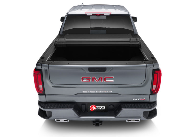 Load image into Gallery viewer, BAK 14-18 Chevy Silverado/GM Sierra Revolver X4s 6.7ft Bed Cover (2014 1500/15-19 1500/2500/3500)