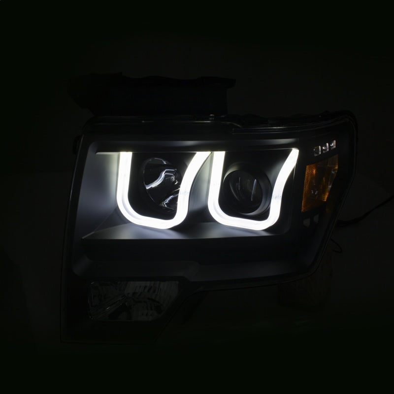 Load image into Gallery viewer, ANZO 2009-2014 Ford F-150 Projector Headlights w/ U-Bar Switchback Black w/ Amber