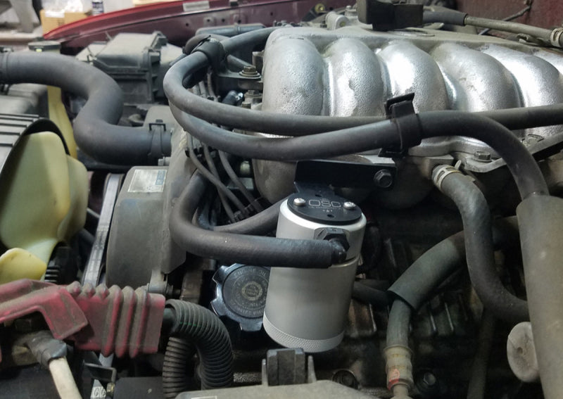 Load image into Gallery viewer, J&L 95-04 Toyota Tacoma/4Runner 3.4L Driver Side Oil Separator 3.0 - Clear Anodized