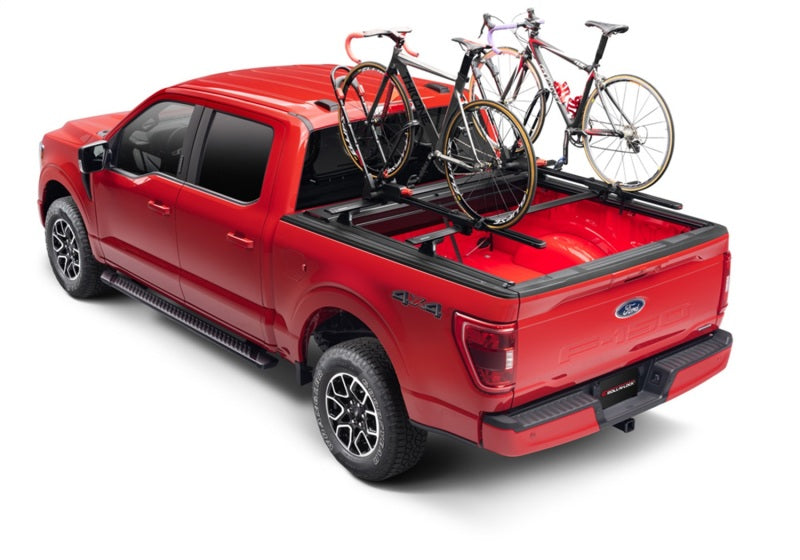 Load image into Gallery viewer, Roll-N-Lock 21-22 Ford F150 (w/o OE Cargo Tracks - 67.1in Bed) E-Series XT Retractable Tonneau Cover