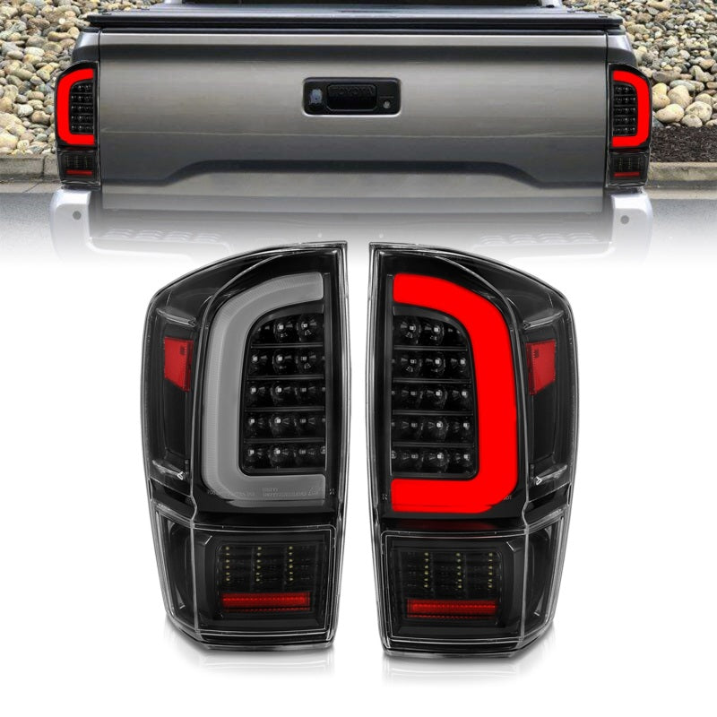 Load image into Gallery viewer, ANZO 16-21 Toyota Tacoma LED Tail Lights - w/ Light Bar Sequential Black Housing & Clear Lens
