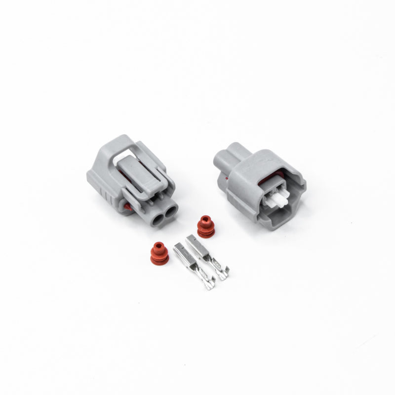 Load image into Gallery viewer, DeatschWerks Sumitomo Electrical Connector Housing & Pins for Re-Pining - Case of 50