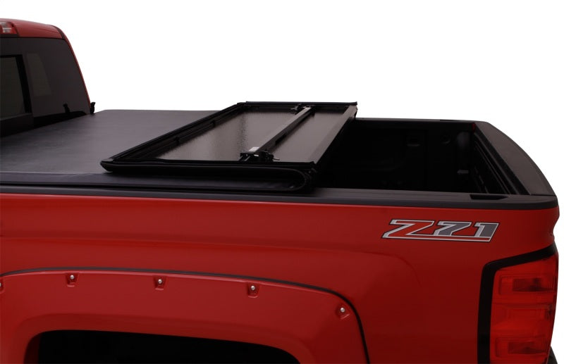 Load image into Gallery viewer, Lund 99-17 Ford F-250 Super Duty Styleside (6.8ft. Bed) Hard Fold Tonneau Cover - Black