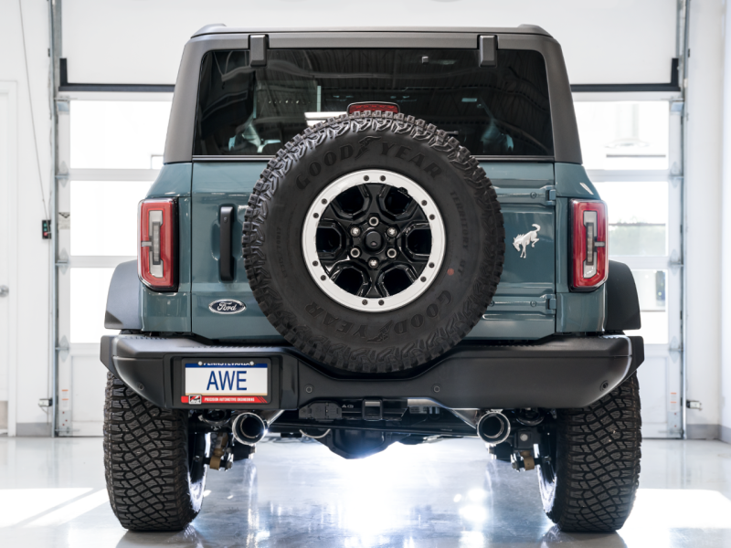 Load image into Gallery viewer, AWE Tuning 2021+ Ford Bronco 0FG Dual Rear Exit Exhaust w/Chrome Silver Tips & Bash Guard