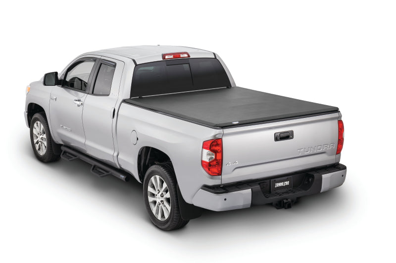 Load image into Gallery viewer, Tonno Pro 04-15 Nissan Titan (Incl. Track Sys Clamp Kit) 6ft. 7in. Bed Tonno Fold Tonneau Cover