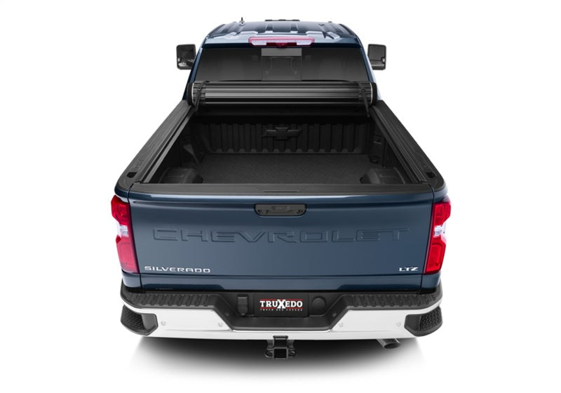 Load image into Gallery viewer, Truxedo 2020 GMC Sierra & Chevrolet Silverado 2500HD & 3500HD 6ft 9in Sentry Bed Cover