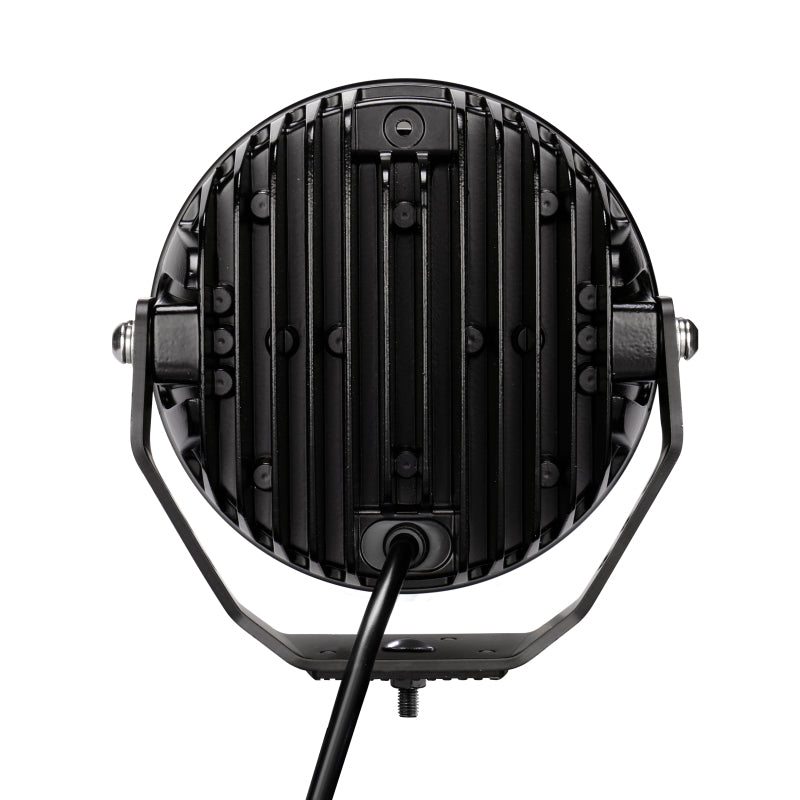 Load image into Gallery viewer, Go Rhino Xplor Blackout Series Round LED Driving Light w/DRL (Surface/Threaded Stud Mnt) 7in. - Blk