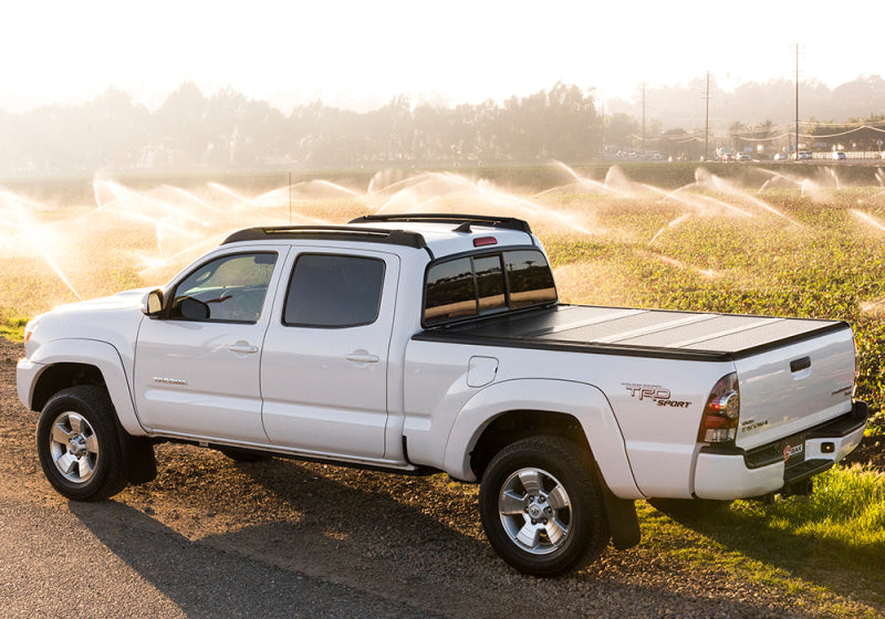 Load image into Gallery viewer, BAK 04-15 Nissan Titan 5ft 6in Bed BAKFlip G2