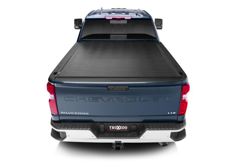 Load image into Gallery viewer, Truxedo 2020 GMC Sierra & Chevrolet Silverado 2500HD & 3500HD 6ft 9in Sentry Bed Cover