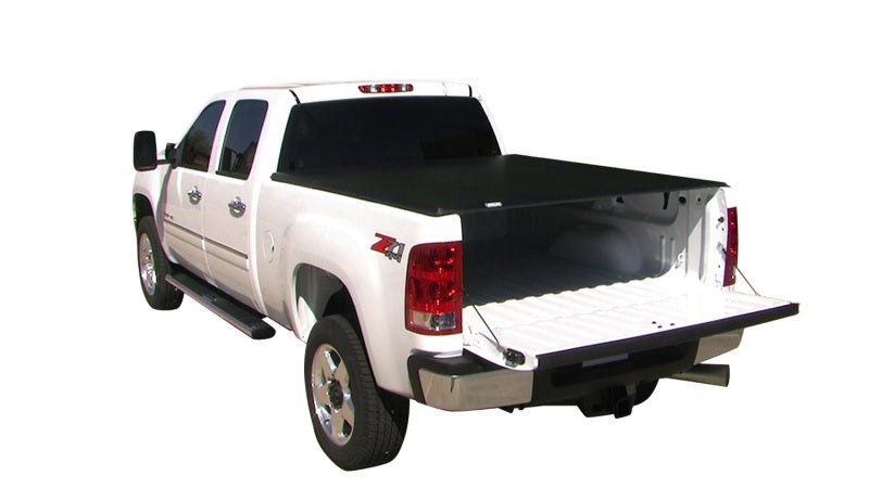 Load image into Gallery viewer, Tonno Pro 04-15 Nissan Titan 5.5ft (Incl 42-498 Utility Track Kit) Hard Fold Tonneau Cover