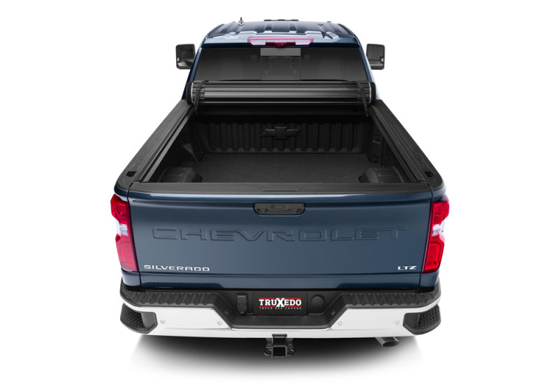 Load image into Gallery viewer, Truxedo 2020 GMC Sierra & Chevrolet Silverado 2500HD & 3500HD 6ft 9in Sentry Bed Cover
