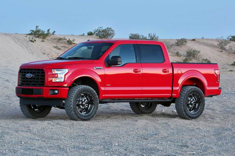 Load image into Gallery viewer, Fabtech 15-20 Ford F150 2WD 4in Perf Sys w/2.5 & 2.25