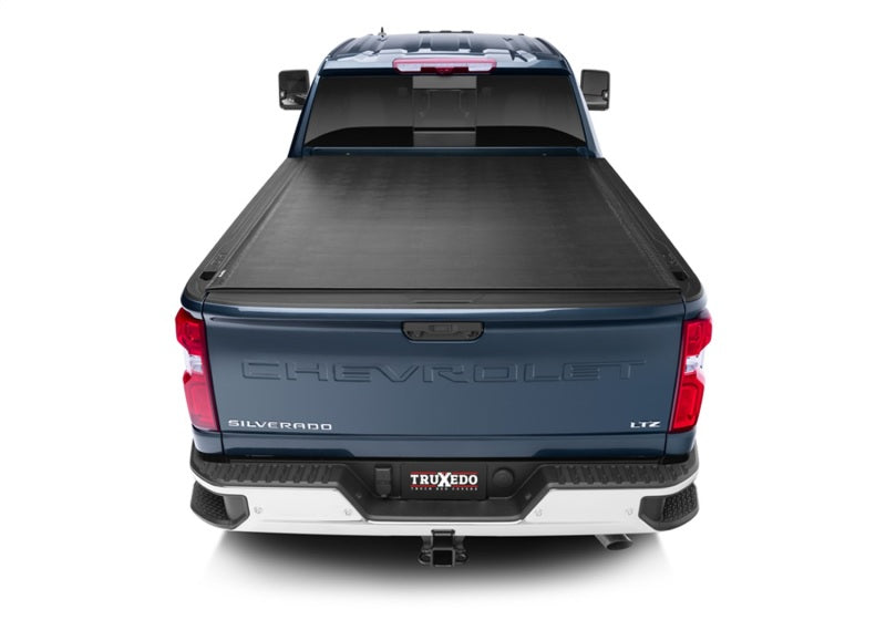 Load image into Gallery viewer, Truxedo 2020 GMC Sierra & Chevrolet Silverado 2500HD & 3500HD 6ft 9in Sentry Bed Cover