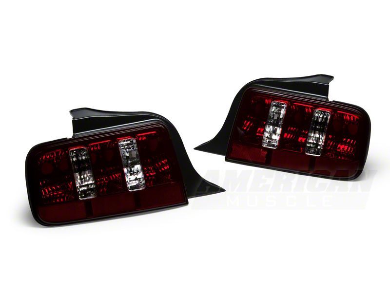 Load image into Gallery viewer, Raxiom 05-09 Ford Mustang Coyote Tail Lights- Blk Housing (Smoked Lens)
