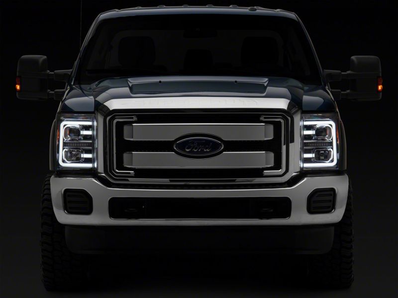 Load image into Gallery viewer, Raxiom 11-16 Ford F-250 Super Duty LED Projector Headlights - Chrome Housing (Clear Lens)
