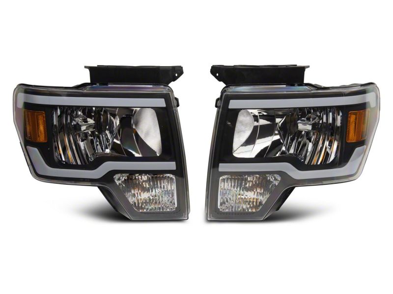 Load image into Gallery viewer, Raxiom 09-14 Ford F-150 Axial Series Headlight w/ SEQL LED Bar- Blk Housing (Clear Lens)
