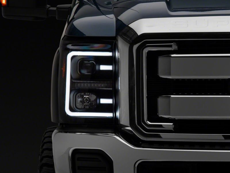 Load image into Gallery viewer, Raxiom 11-16 Ford F-250 Super Duty LED Projector Headlights - Blk Housing (Clear Lens)
