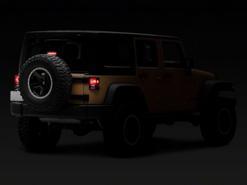 Load image into Gallery viewer, Raxiom 07-18 Jeep Wrangler JK Axial Series Hyper Flash LED Third Brake Light- Smoked
