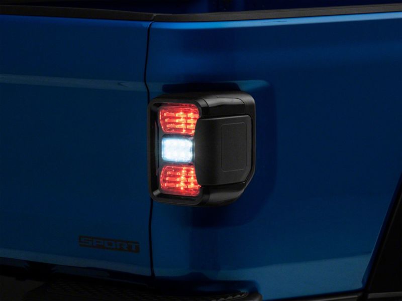 Load image into Gallery viewer, Raxiom 20-23 Jeep Gladiator JT Axial Series LED Tail Lights- Blk Housing (Smoked Lens)
