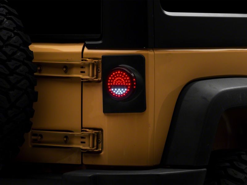 Load image into Gallery viewer, Raxiom 07-18 Jeep Wrangler JK Axial Series Halo LED Tail Lights- Blk Housing (Clear Lens)
