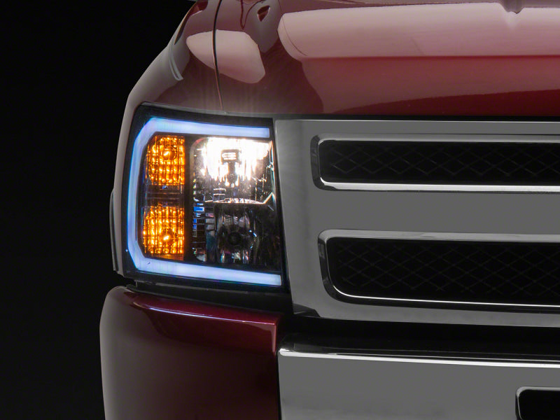 Load image into Gallery viewer, Raxiom 07-13 Chevrolet Silverado 1500 Axial Headlights w/ SEQL LED Bar- Blk Housing (Clear Lens)
