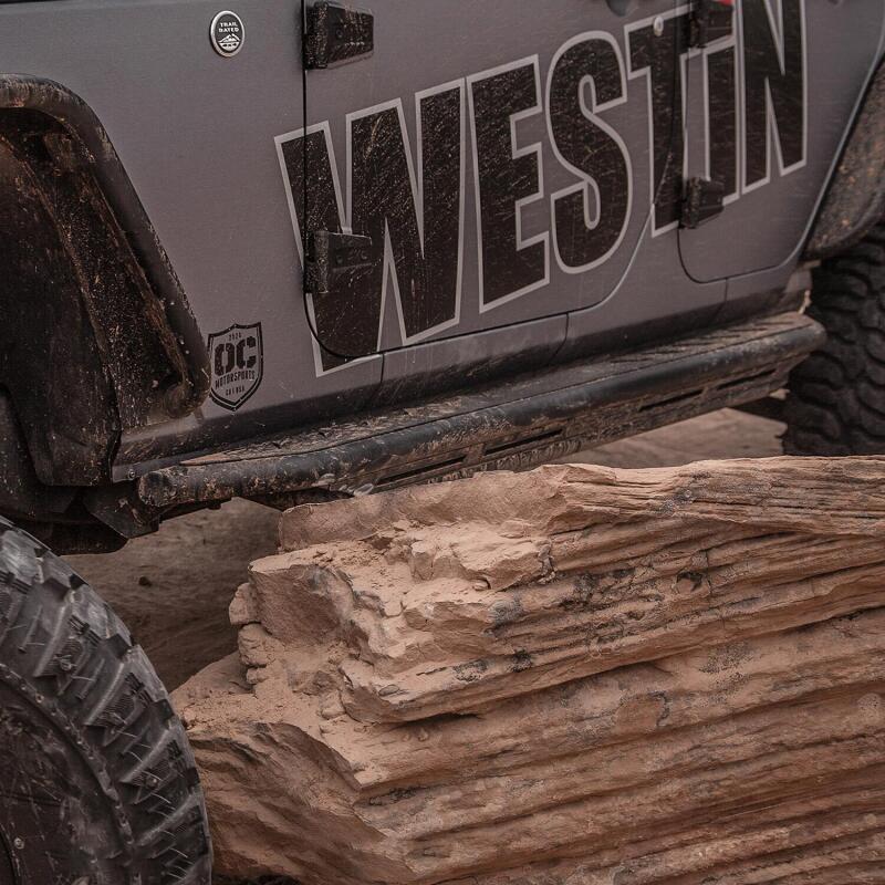 Load image into Gallery viewer, Westin/Snyper 07-17 Jeep Wrangler Unlimited Triple Tube Rock Rail Steps - Textured Black
