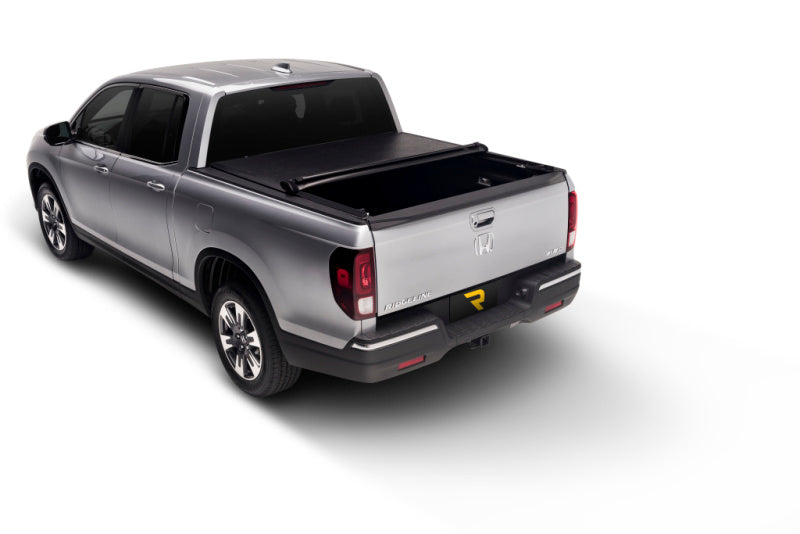 Load image into Gallery viewer, Truxedo 05-15 Nissan Navara w/Rack 6ft Lo Pro International Bed Cover
