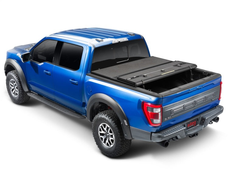 Load image into Gallery viewer, Extang 17-23 Nissan Titan w/o Rail Sys. (5ft. 7in. Bed) Solid Fold ALX
