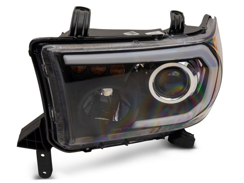 Load image into Gallery viewer, Raxiom 07-13 Toyota Tundra Axial Series Projector Headlights w/ LED Bar- Blk Housing (Clear Lens)
