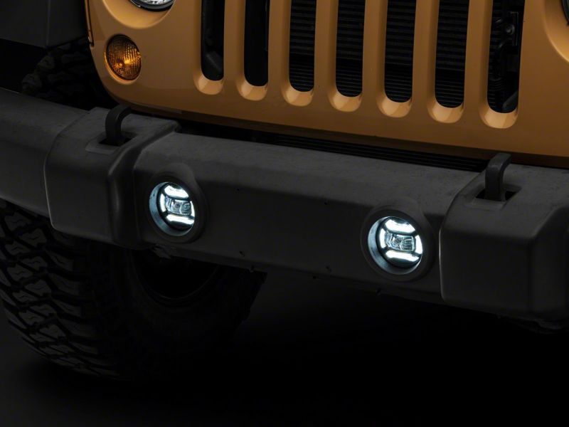 Load image into Gallery viewer, Raxiom 07-18 Jeep Wrangler JK Axial Series 4-In LED Fog Lights- Clear
