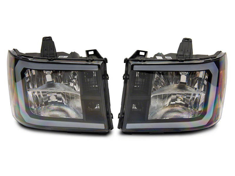 Load image into Gallery viewer, Raxiom 07-13 GMC Sierra 1500 Axial Series Headlights w/ LED Bar- Blk Housing (Clear Lens)
