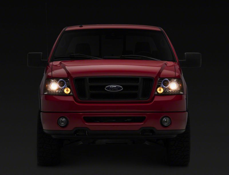 Load image into Gallery viewer, Raxiom 04-08 Ford F-150 Dual LED Halo Projector Headlights- Chrome Housing (Clear Lens)
