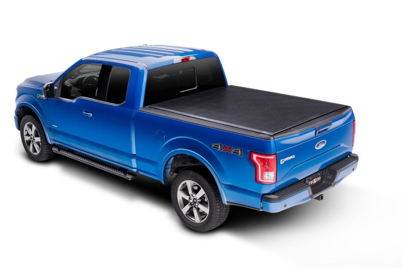 Load image into Gallery viewer, Truxedo 05-15 Nissan Navara w/Rack 6ft Lo Pro International Bed Cover
