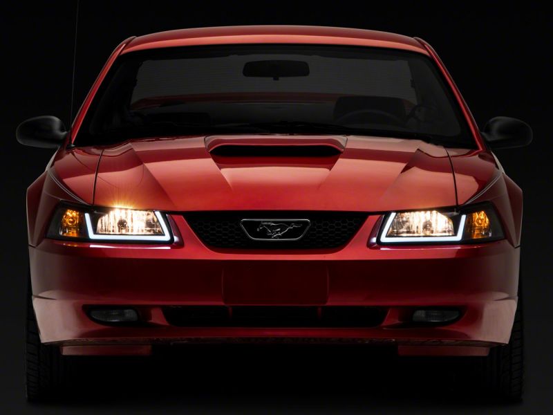 Load image into Gallery viewer, Raxiom 99-04 Ford Mustang Axial Series Headlights w/ LED Bar- Black Housing (Clear Lens)
