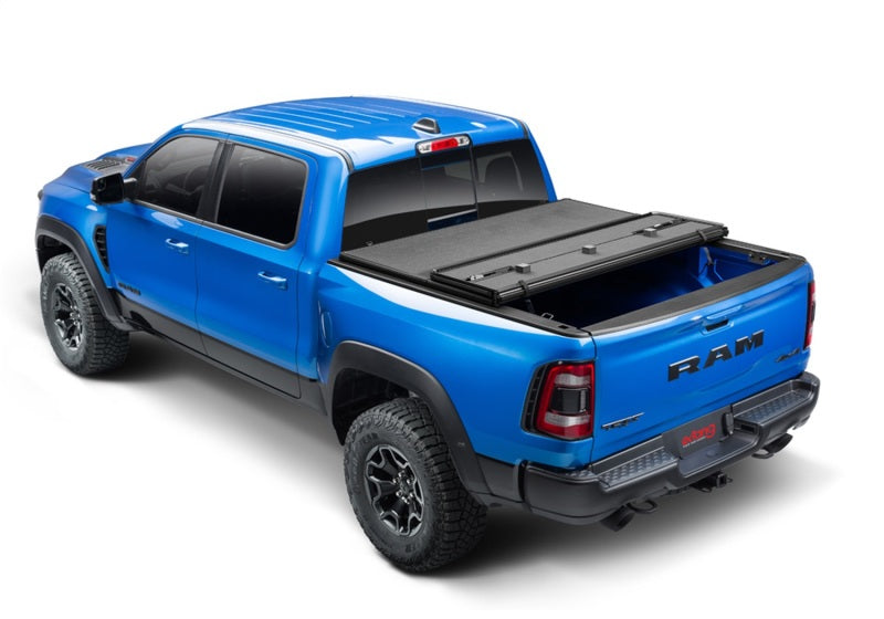 Load image into Gallery viewer, Extang 19-23 Dodge Ram w/RamBox New Body (5ft. 7in. Bed) Solid Fold ALX
