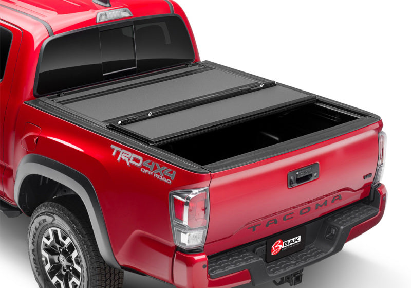 Load image into Gallery viewer, BAK 2024 Toyota Tacoma 5ft Bed BAKFlip MX4 Bed Cover
