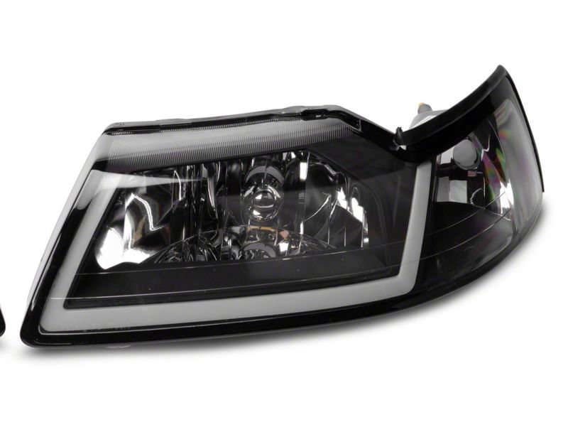Load image into Gallery viewer, Raxiom 99-04 Ford Mustang Axial Series Headlights w/ LED Bar- Black Housing (Clear Lens)
