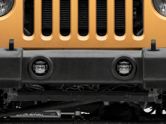 Raxiom 07-18 Jeep Wrangler JK Axial Series 4-In LED Fog Lights- Clear