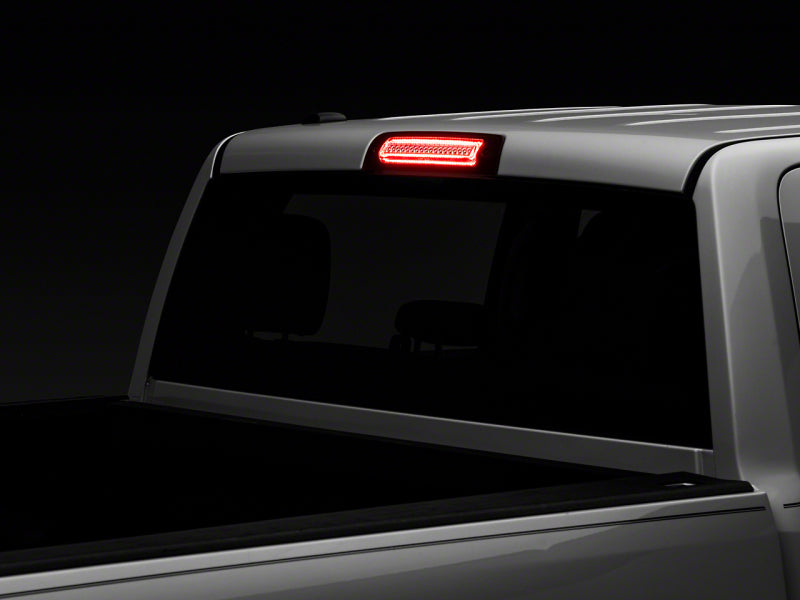 Load image into Gallery viewer, Raxiom 09-18 Dodge RAM 1500 10-18 Dodge RAM 2500/3500 Axial Series LED Third Brake Light- Red
