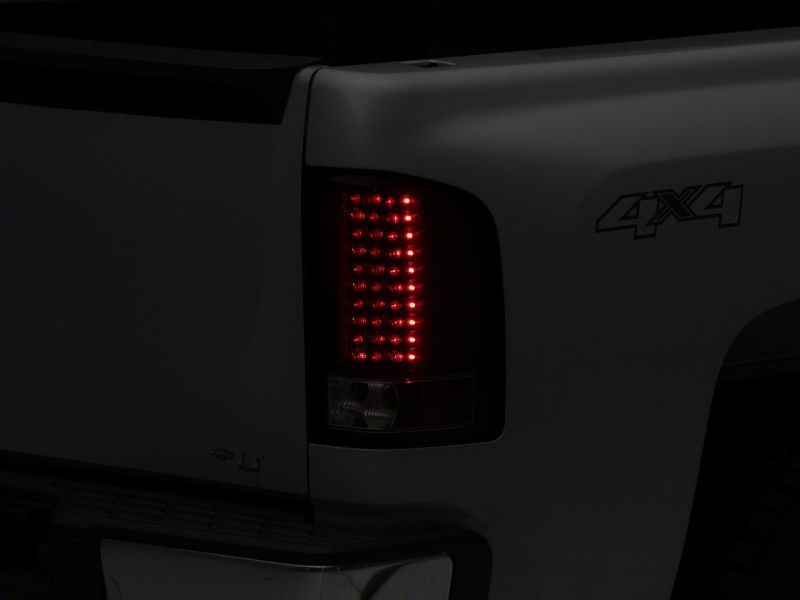 Load image into Gallery viewer, Raxiom 07-13 Chevrolet Silverado 1500 LED Tail Lights- Blk Housing (Clear Lens)
