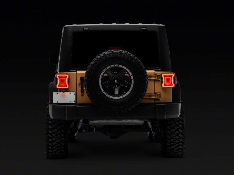 Load image into Gallery viewer, Raxiom 07-18 Jeep Wrangler JK Axial Series JL Style LED Tail Lights- BlkHousing- Red Lens
