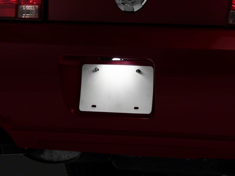 Load image into Gallery viewer, Raxiom 05-09 Ford Mustang Axial Series LED License Plate Lamps
