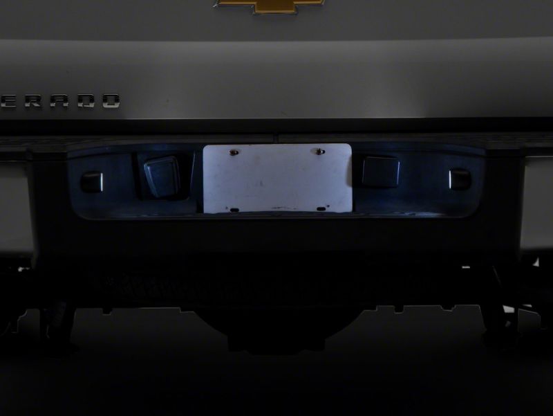 Load image into Gallery viewer, Raxiom 99-14 Chevrolet Silverado Axial Series LED License Plate Lamps
