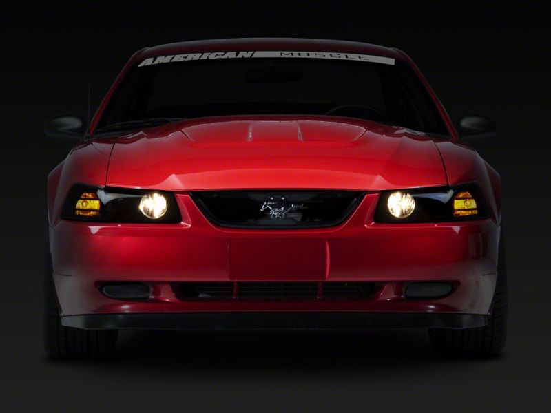 Load image into Gallery viewer, Raxiom 99-04 Ford Mustang Axial Series Projector Headlights- Black Housing (Smoked Lens)
