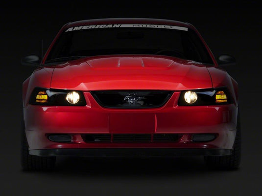 Raxiom 99-04 Ford Mustang Axial Series Projector Headlights- Black Housing (Smoked Lens)