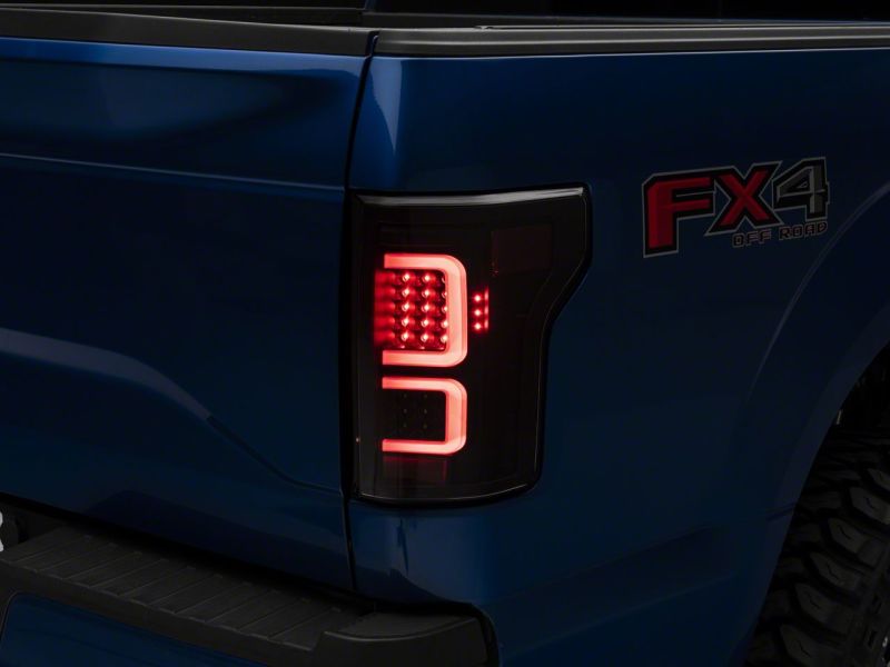 Load image into Gallery viewer, Raxiom 15-17 Ford F-150 G3 LED Tail Lights- Blk Housing (Clear Lens)
