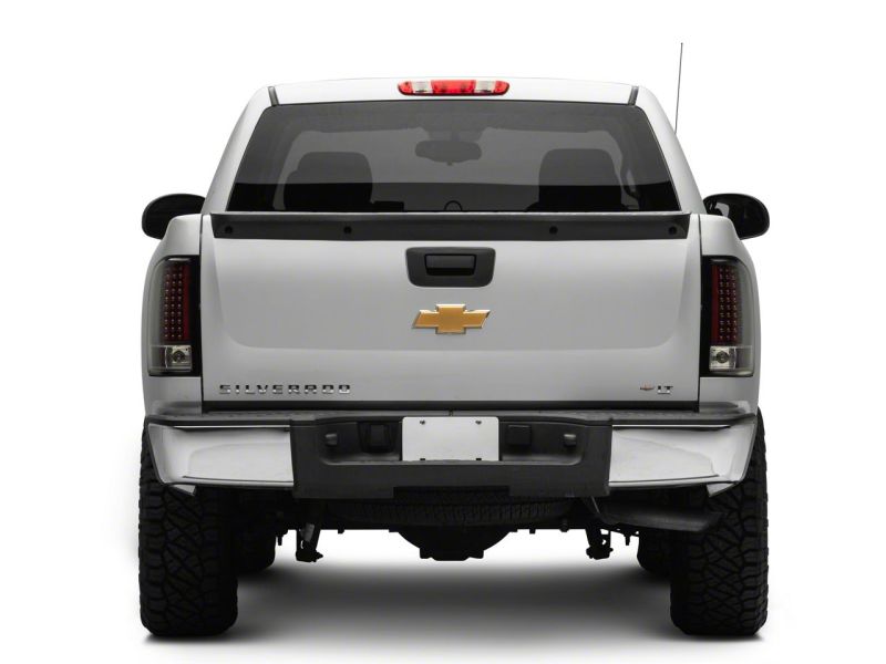 Load image into Gallery viewer, Raxiom 07-13 Chevrolet Silverado 1500 LED Tail Lights- Blk Housing (Clear Lens)
